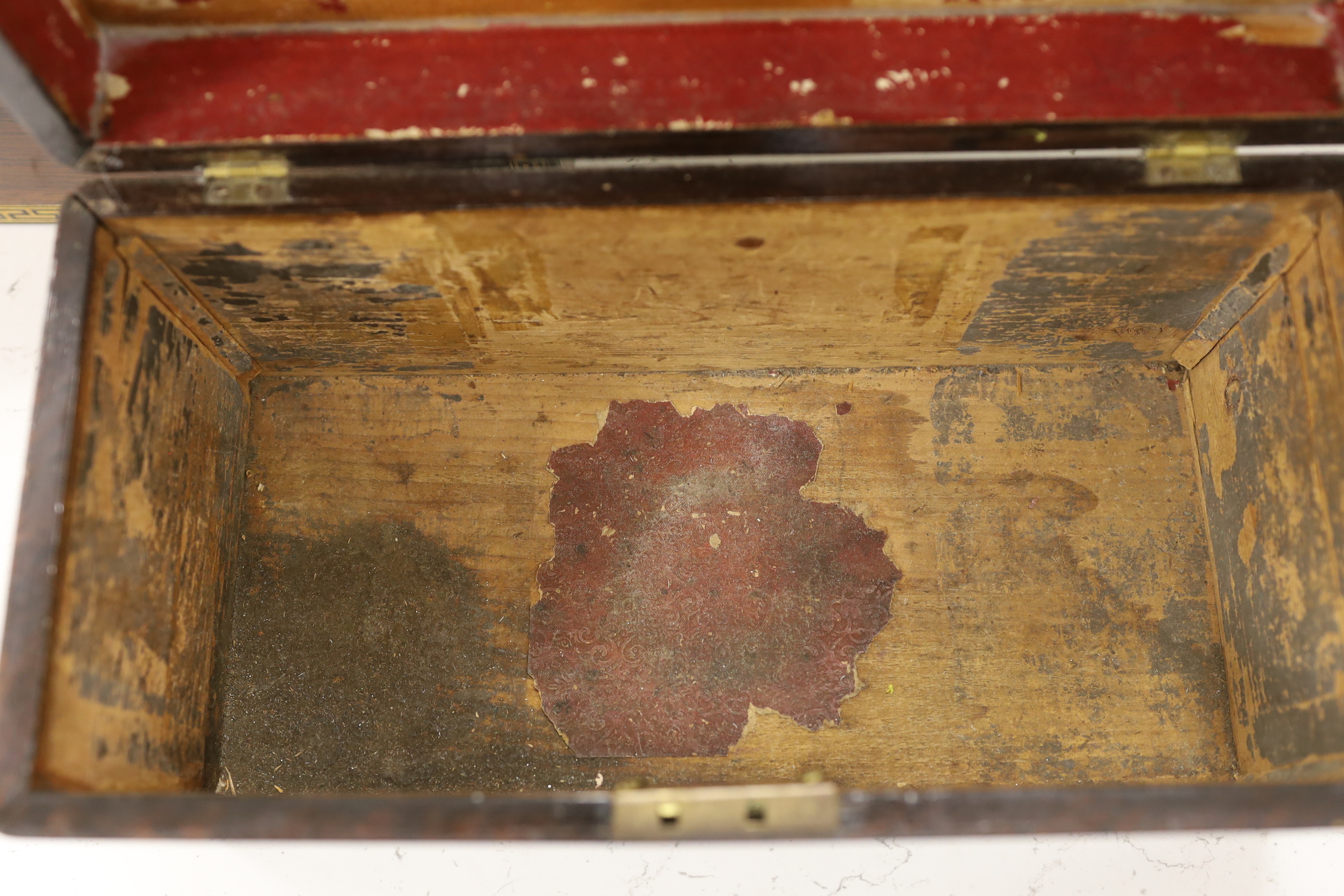 A Victorian rosewood tea caddy with ornate stringing and fitted interior and a mahogany tea caddy, interior missing, rosewood caddy 32.5cm wide, 17cm high